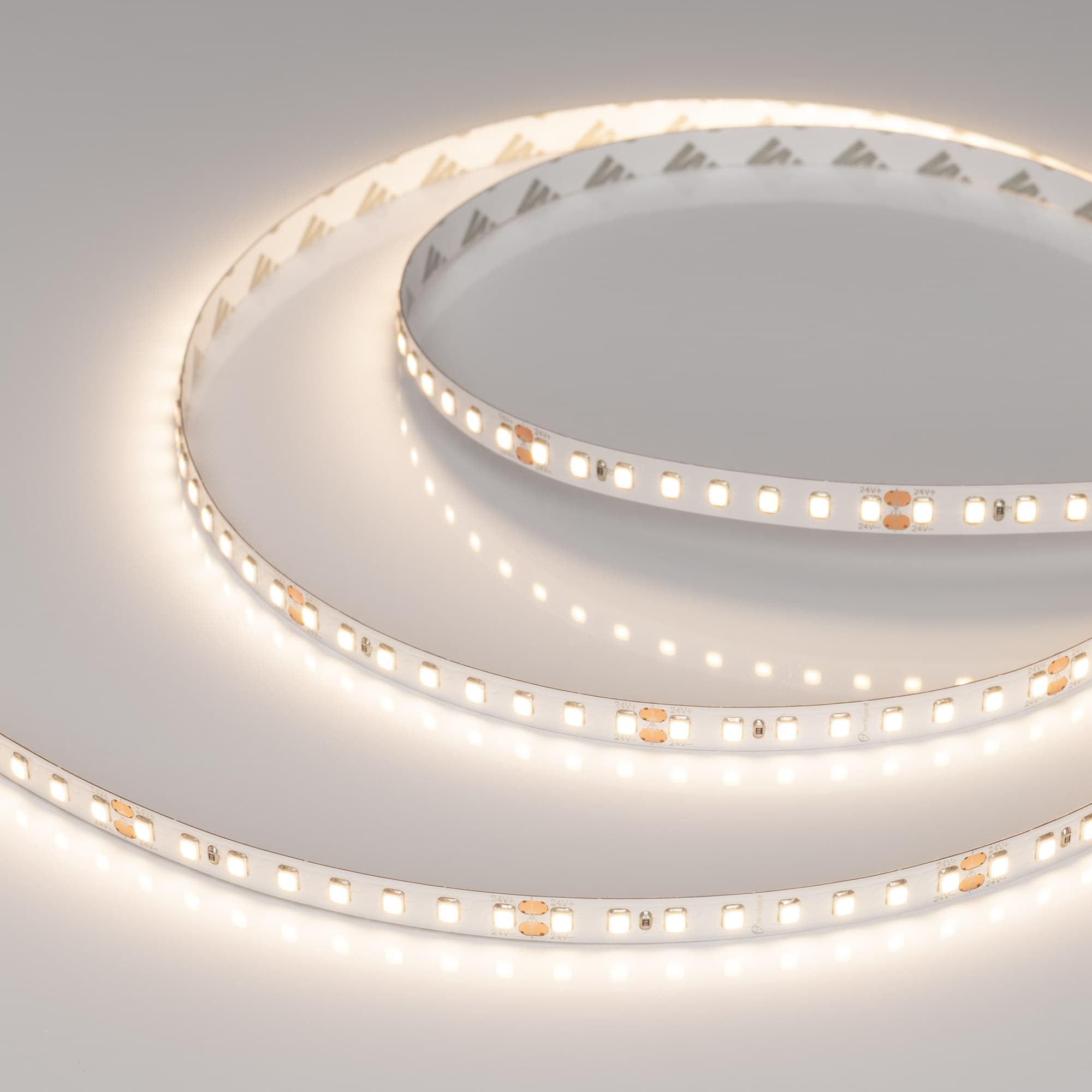 Светодиодная лента RT-A128-8mm 24V Warm3500 (9.6 W/m, IP20, 2835, 5m) (Arlight, высок.эфф.150 лм/Вт) 038757 — фото 1