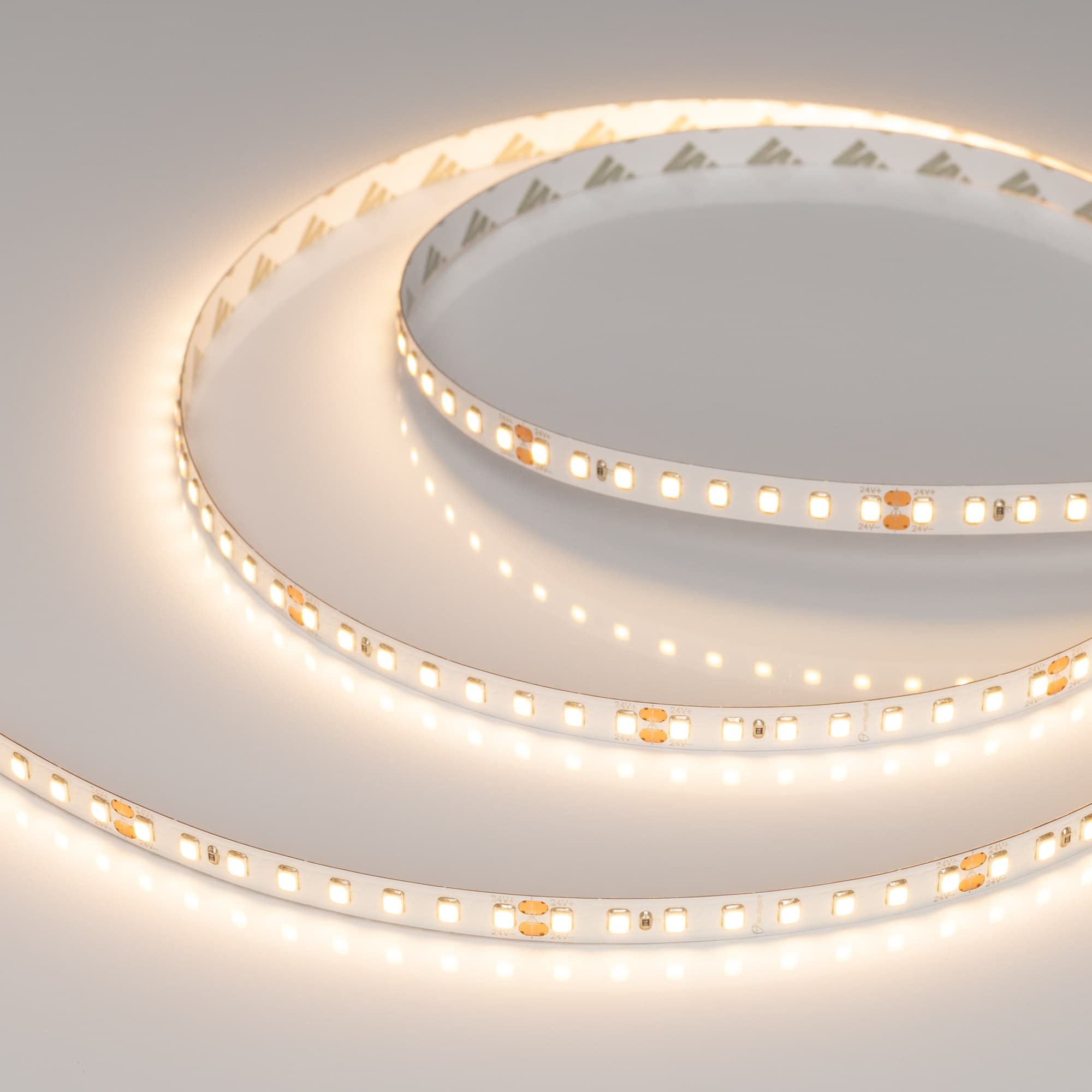 Светодиодная лента RT-A128-8mm 24V Warm2700 (9.6 W/m, IP20, 2835, 5m) (Arlight, высок.эфф.150 лм/Вт) 038759 — фото 1