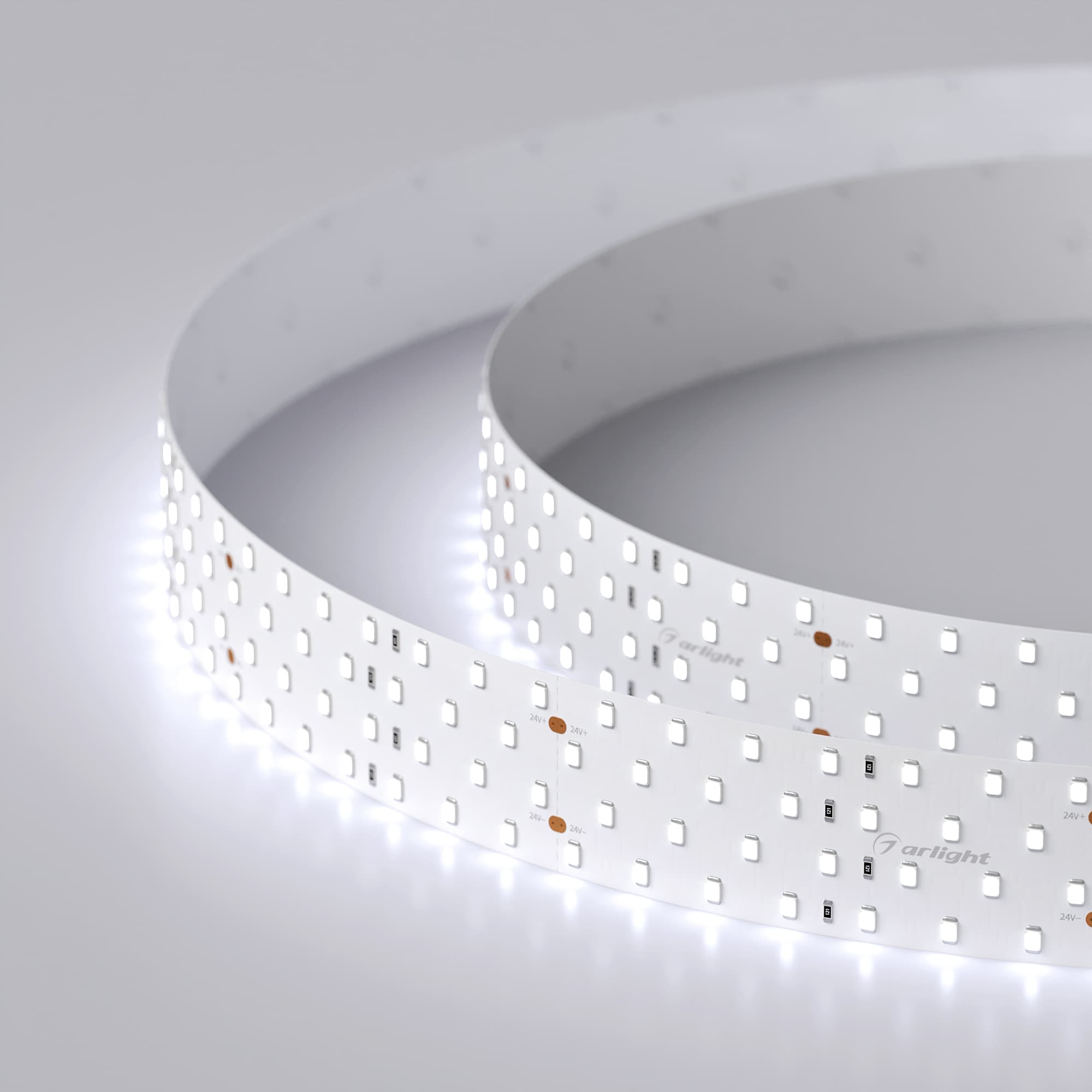 Светодиодная лента RT 2-2500 24V Cool 8K 4x2 (2835, 700 LED, LUX) (Arlight, 30 Вт/м, IP20) 019084 — фото 1
