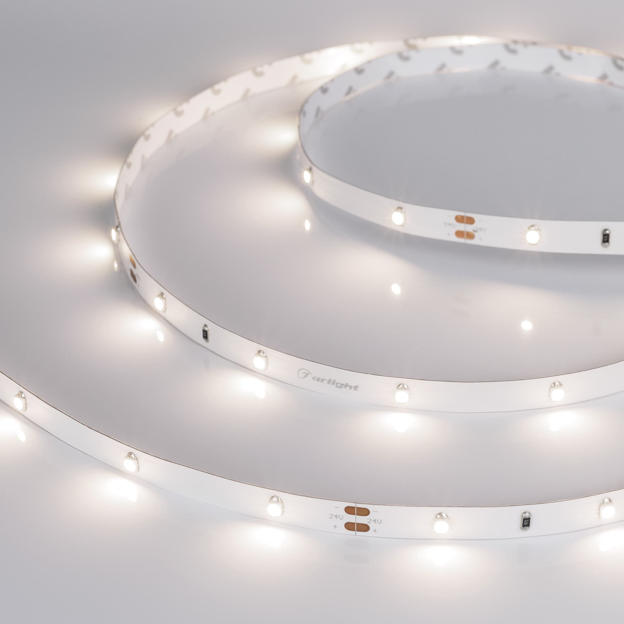 Светодиодная лента RT 2-5000 24V Day4000 0.5x (3528, 150 LED, LUX) (Arlight, 2.9 Вт/м, IP20) 019918 — фото 1